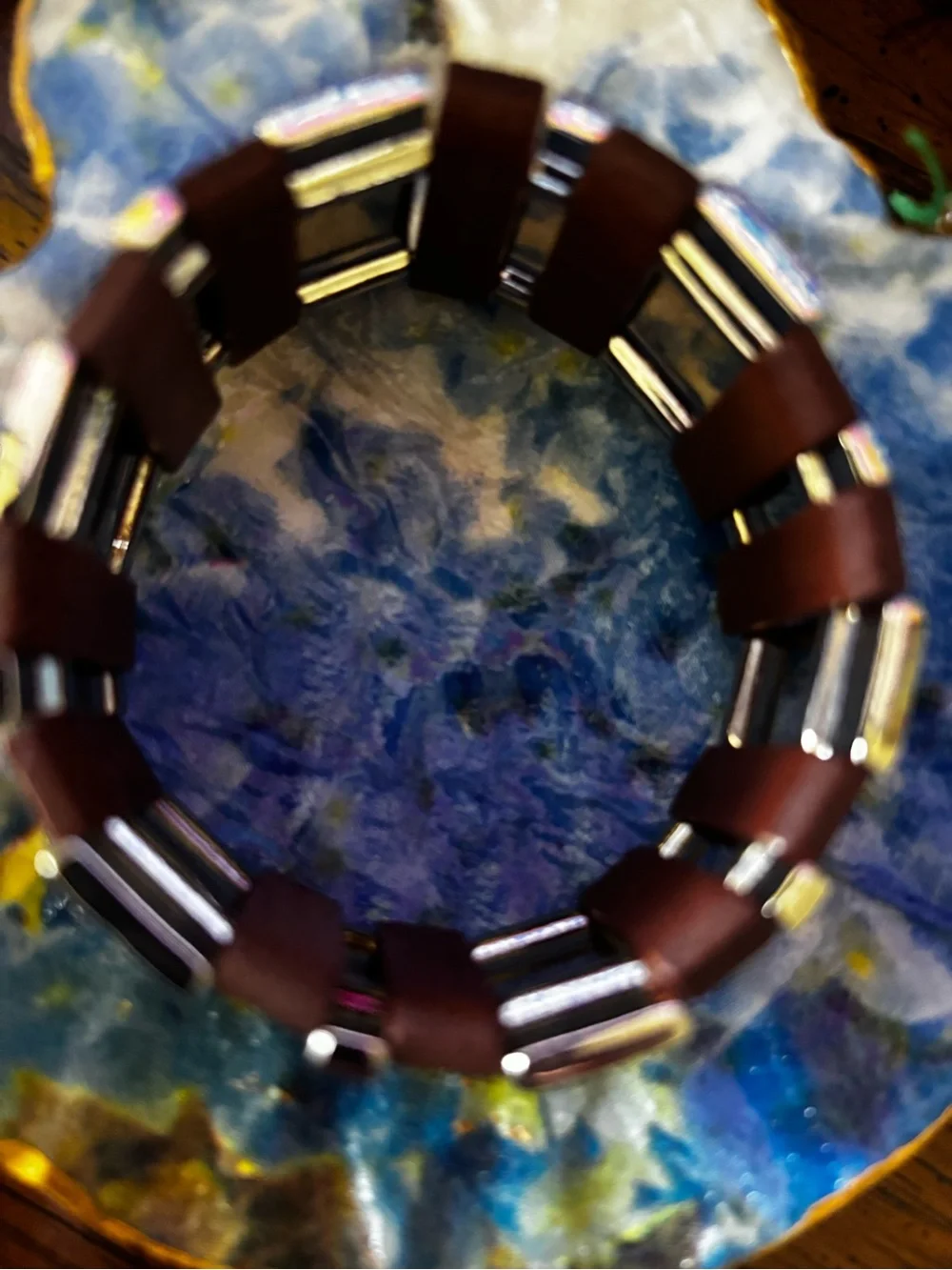 vintage multi-strand leather expansion bracelet accented with alternating silver